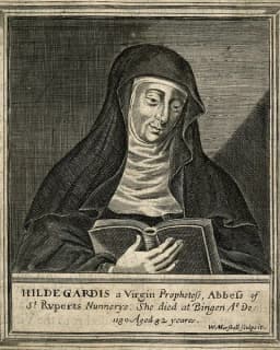 Engraving of Hildegard of Bingen in a nun's habit, reading